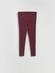 Legginsy z wysokim pasem - mahoniowy. Brązowe legginsy Reserved, l, bez wzorów, z dzianiny. Za 79.99 zł.