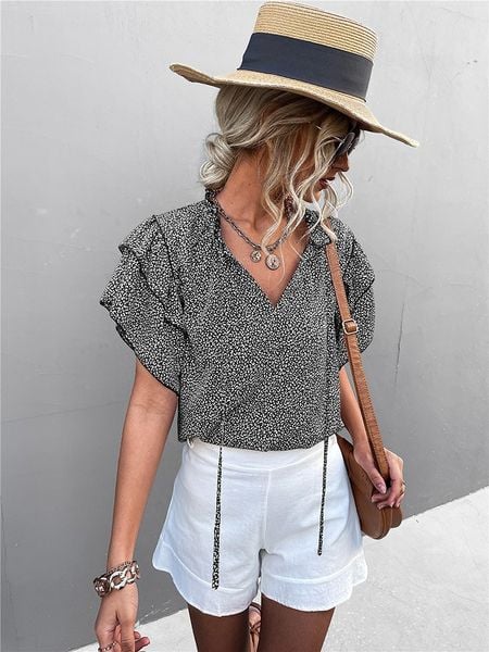 Ariel Tesoro Bluzka w kolorze czarnym rozmiar: 38. Czarne bluzki Ariel Tesoro, bez wzorów, bez kołnierzyka, bez ramiączek. Za 109.52 zł.