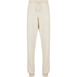 Spodnie dresowe dla kobiet Urban Classics Light Terry. Białe spodnie dresowe Urban Classics, bez wzorów, z dresówki. Za 191.00 zł.