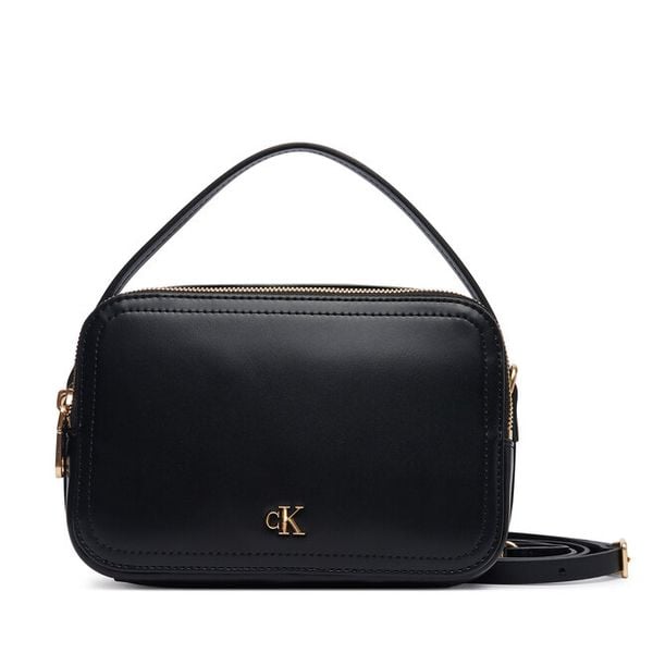 Torebka Calvin Klein. Czarne listonoszki Calvin Klein, bez wzorów, bez dodatków. Za 409.99 zł.