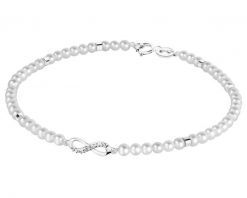 Bransoletka z diamentem, perłami i elementami białego złota - nieskończoność - 18 cm - próba 585. Białe bransoletki Apart, z diamentem, złote. Za 1,990.00 zł.
