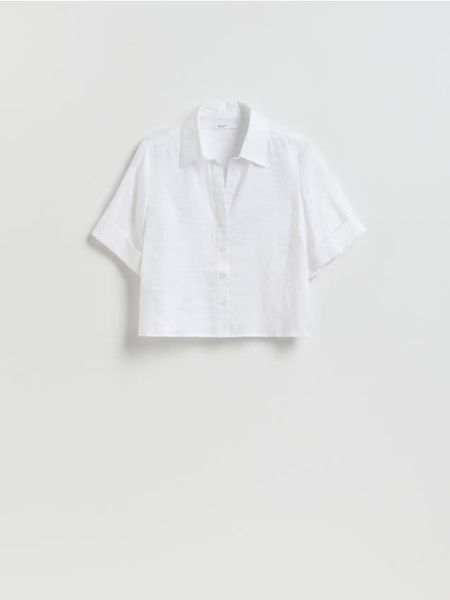Lniana koszula - biały. Białe koszule Reserved, l, bez wzorów, bez kołnierzyka, bez ramiączek. Za 129.99 zł.