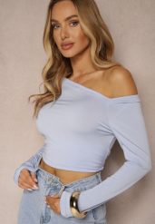 Niebieska Asymetryczna Bluzka z Odkrytym Ramieniem Ninavena. Niebieskie bluzki Renee, l, bez wzorów, z jeansu, eleganckie, z asymetrycznym kołnierzem, bez ramiączek. W wyprzedaży za 62.99 zł.