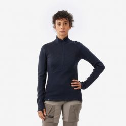 Koszulka damska trekkingowa z długim rękawem Merino Resist. Czarne bluzki FORCLAZ, m, bez wzorów, z materiału, sportowe, bez kołnierzyka, bez ramiączek. Za 299.99 zł.