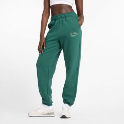 Spodnie damskie New Balance WP43500NWG – zielone. Zielone spodnie dresowe New Balance, na co dzień, s, z aplikacjami, z bawełny, z podwyższonym stanem. Za 299.99 zł.