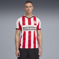 Koszulka piłkarska oficjalna Puma PSV Eindhoven 25/26 domowa. Bluzki Puma, s, bez wzorów, z materiału, sportowe, bez kołnierzyka, bez ramiączek. Za 459.99 zł.