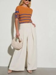 Milan Kiss Spodnie w kolorze kremowym rozmiar: S. Brązowe spodnie materiałowe Milan Kiss, s, bez wzorów, z materiału. Za 178.95 zł.