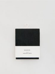 Rajstopy z metalizowaną nitką 30 DEN - czarny. Czarne rajstopy i pończochy Reserved, bez wzorów. Za 39.99 zł.