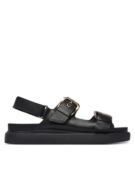 Clarks Sandały Aristella Bay 26185807 Czarny. Czarne sandały Clarks, bez wzorów, ze skóry, bez obcasa, na płaskiej podeszwie, bez zapięcia. Za 360.99 zł.