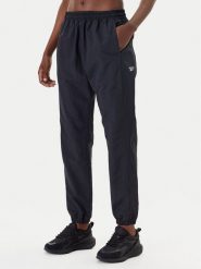 Reebok Spodnie dresowe Vector 100221435 Czarny Relaxed Fit. Czarne spodnie dresowe Reebok, s, bez wzorów, z dresówki. Za 149.99 zł.