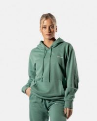 Damska bluza z kapturem 365 oversize z kieszenią kangurką – ciemnozielony. Zielone bluzy AESTHETIC WOLF, s, bez wzorów, z bawełny, z kapturem. Za 159.99 zł.