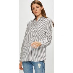 Tommy Jeans - Koszula. Białe koszule Tommy Jeans, s, bez wzorów, z bawełny, casualowe, bez kołnierzyka, bez ramiączek. W wyprzedaży za 259.90 zł.