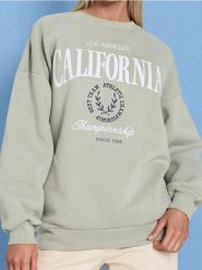 Bluza z nadrukiem - zielony. Zielone bluzy Sinsay, l, bez wzorów, bez kaptura. W wyprzedaży za 17.99 zł.