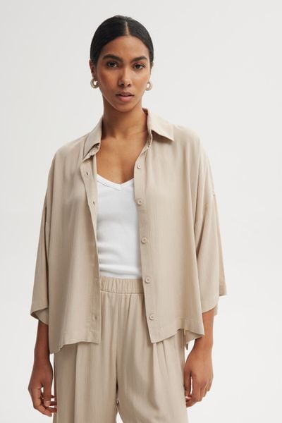 KOSZULA MEL PIASKOWA XL - Flawless. Koszule Flawless, uniwersalny, bez wzorów, z materiału, klasyczne, bez kołnierzyka, bez ramiączek. Za 397.00 zł.