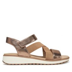 Sandały Caprice. Brązowe sandały Caprice, bez wzorów, bez obcasa, na koturnie, bez zapięcia. Za 249.99 zł.
