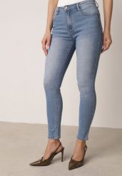 Niebieskie Dopasowane Jeansy z Bawełną z Efektem Push-Up Eriflare. Niebieskie jeansy Born2be, l, bez wzorów. Za 89.99 zł.