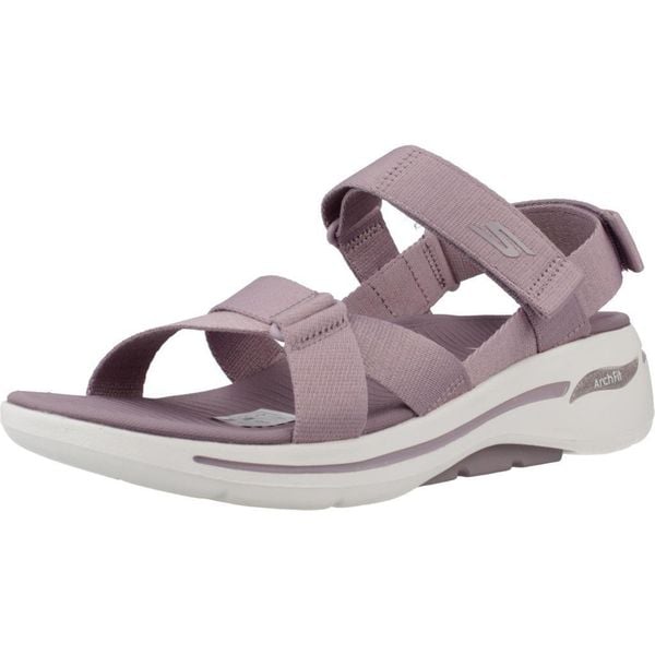 Sandały SKECHERS GO WALK ARCH FIT SANDAL Fioletowy. Fioletowe sandały Skechers, bez wzorów, bez obcasa, bez zapięcia. Za 292.99 zł.