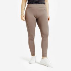 Legginsy jeździeckie damskie ciepłe z silikonowym lejem. Czarne legginsy FOUGANZA, s, bez wzorów, z materiału, z podwyższonym stanem, długie. Za 199.99 zł.
