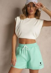 Jasnozielone Klasyczne Szorty Dresowe z Kieszeniami Wiązane w Pasie Folenelle. Zielone szorty Renee, bez wzorów, z dresówki, eleganckie. Za 44.99 zł.