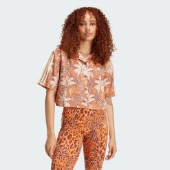 Koszula adidas x FARM Rio. Brązowe koszule Adidas, l, bez wzorów, z materiału, bez kołnierzyka, bez ramiączek. W wyprzedaży za 173.40 zł.