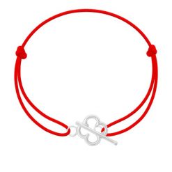 Bransoletka z posrebrzanym zapięciem w kształcie koniczyny na cienkim czerwonym sznurku. Czerwone bransoletki Lilou, posrebrzane. Za 89.00 zł.
