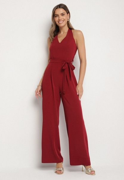 Bordowy Taliowany Kombinezon z Paskiem Wiązaniem i Odkrytymi Plecami Malurea. Czerwone sukienki Born2be, na imprezę, na lato, l, bez wzorów, z jeansu, eleganckie, bez kołnierzyka, bez ramiączek. Za 119.99 zł.