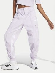 Adidas Spodnie dresowe Dance All-Gender Versatile IS0907 Fioletowy Loose Fit. Fioletowe spodnie dresowe Adidas, l, bez wzorów, z dresówki. Za 229.99 zł.