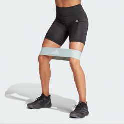 Legginsy Optime 7-Inch. Czarne legginsy Adidas, s, bez wzorów, z materiału, krótkie. Za 170.45 zł.