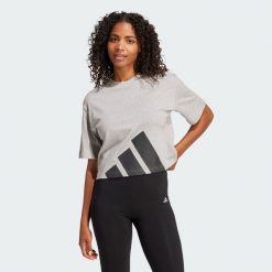 Koszulka Essentials Big Logo Boyfriend. Czarne bluzki Adidas, xs, bez wzorów, sportowe, bez kołnierzyka, bez ramiączek. Za 139.00 zł.