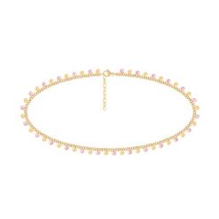 Naszyjnik Sophie z różową emalią, pozłacany. Czerwone naszyjniki Lilou, pozłacane. Za 229.00 zł.