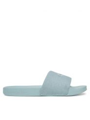 Calvin Klein Jeans Klapki Slide Monogram Wn YW0YW01835 Niebieski. Niebieskie klapki Calvin Klein Jeans, bez wzorów, z jeansu, bez obcasa. Za 99.99 zł.