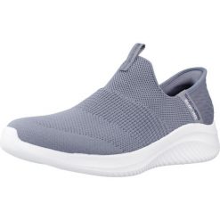 Kapcie SKECHERS SLIP-INS ULTRA FLEX 3.0 COZY STREAK Niebieski. Niebieskie obuwie domowe Skechers, bez wzorów, z tkaniny, bez zapięcia. Za 423.99 zł.