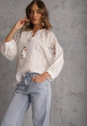 Biała Wiązana Bluzka w Stylu Boho z Tencelu z Koralikami i Koronką Helotis. Białe bluzki Renee, m, z aplikacjami, z koronki, boho, bez kołnierzyka, bez ramiączek. Za 109.99 zł.