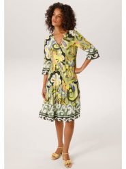 Aniston Sukienka w kolorze zielonym rozmiar: 46. Zielone sukienki Aniston, bez wzorów, z wiskozy, bez kołnierzyka, bez ramiączek, midi. Za 173.99 zł.