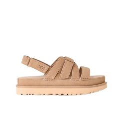 Damskie sandały Ugg W Goldenstar Gleam 1175122-MDS. Brązowe sandały UGG, bez wzorów, z materiału, z okrągłym noskiem, bez obcasa, bez zapięcia. Za 399.00 zł.