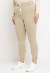 Beżowe Spodnie Skinny ze Sznurkiem w Pasie i Kieszeniami Irfana. Brązowe spodnie materiałowe Born2be, na co dzień, s, bez wzorów, z jeansu. Za 49.99 zł.