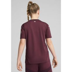 Młodzieżowa koszulka Manchester City 24/25 PUMA Dark Jasper Red. Czerwona bluzki Puma, m, bez wzorów, młodzieżowe, bez kołnierzyka, bez ramiączek. W wyprzedaży za 214.00 zł.