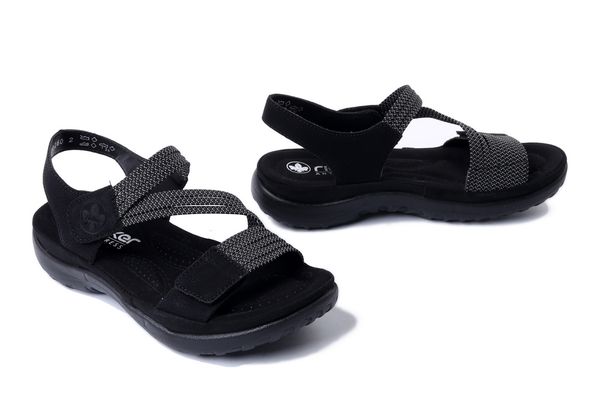 RIEKER 64870-00 black, sandały damskie. Czarne sandały Rieker, bez wzorów, bez obcasa, bez zapięcia. Za 223.93 zł.