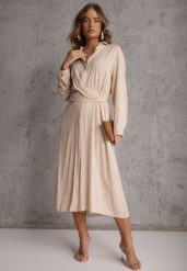 Beżowa Koszulowa Sukienka z Wiskozy z Asymetrycznym Drapowaniem i Guzikiem Hetasa. Brązowe sukienki Renee, na co dzień, l, bez wzorów, z wiskozy, eleganckie, z asymetrycznym kołnierzem, bez ramiączek, asymetryczne. Za 129.99 zł.