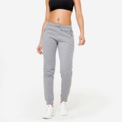 Spodnie dresowe damskie Domyos Gym & Pilates slim. Szare spodnie dresowe DOMYOS, xl, bez wzorów, z dresówki, na fitness i siłownię. Za 89.99 zł.