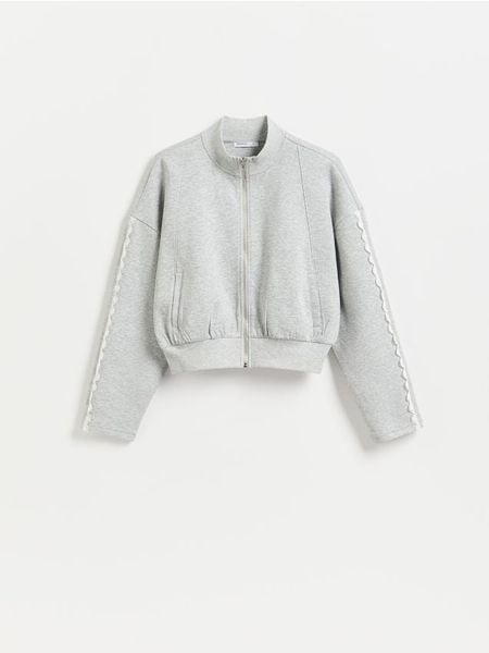 Bluza z ażurowymi wstawkami - jasnoszary. Szare bluzy Reserved, l, w ażurowe wzory, z bawełny, bez kaptura. Za 99.99 zł.
