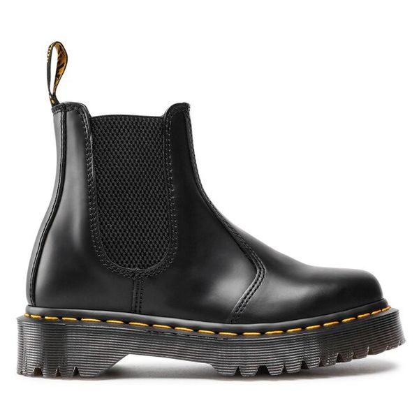 Sztyblety Dr. Martens. Czarne botki Dr. Martens, bez wzorów, bez obcasa, na płaskiej podeszwie, bez zapięcia. Za 1,039.00 zł.