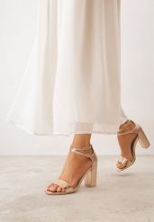 Szampańskie Sandały na Obcasie VICES z Wkładką ze Skóry Naturalnej i Paskami Paphis. Żółte sandały Born2be, bez wzorów, ze skóry, biznesowe, bez obcasa, na obcasie, bez zapięcia. Za 109.99 zł.