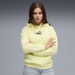 Damska bluza z kapturem Essentials Nature 2.0 Comfort PUMA Gold Moon Yellow. Żółte bluzy Puma, bez wzorów, z kapturem. Za 249.00 zł.