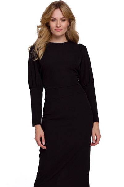 Elegancka sukienka z odkrytymi plecami czarna z rozcięciem. Czarne sukienki Sukienki.shop, na imprezę, m, bez wzorów, eleganckie, bez kołnierzyka, bez ramiączek. W wyprzedaży za 329.00 zł.