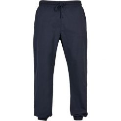 Damski strój do joggingu Urban Classics Basic. Niebieskie spodnie dresowe Urban Classics, bez wzorów, z dresówki. Za 221.50 zł.