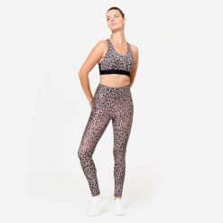 Stanik sportowy Domyos. Brązowe koszulki sportowe DECATHLON, bez wzorów, z elastanu, bez ramiączek, na jogę i pilates. Za 69.99 zł.