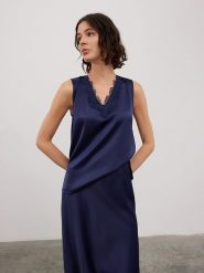 BGN Top w kolorze granatowym rozmiar: 36. Niebieskie topy BGN, bez wzorów, bez kołnierzyka, bez ramiączek. Za 74.28 zł.