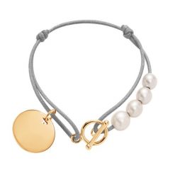 Bransoletka Madeleine pozłacana. Białe bransoletki Lilou, z perłą, pozłacane. Za 262.00 zł.