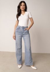 Niebieskie Szerokie Jeansy Bawełniane z Wysokim Stanem Helemenor. Niebieskie spodnie materiałowe Born2be, do pracy, l, bez wzorów, z bawełny, z podwyższonym stanem, długie. Za 109.99 zł.